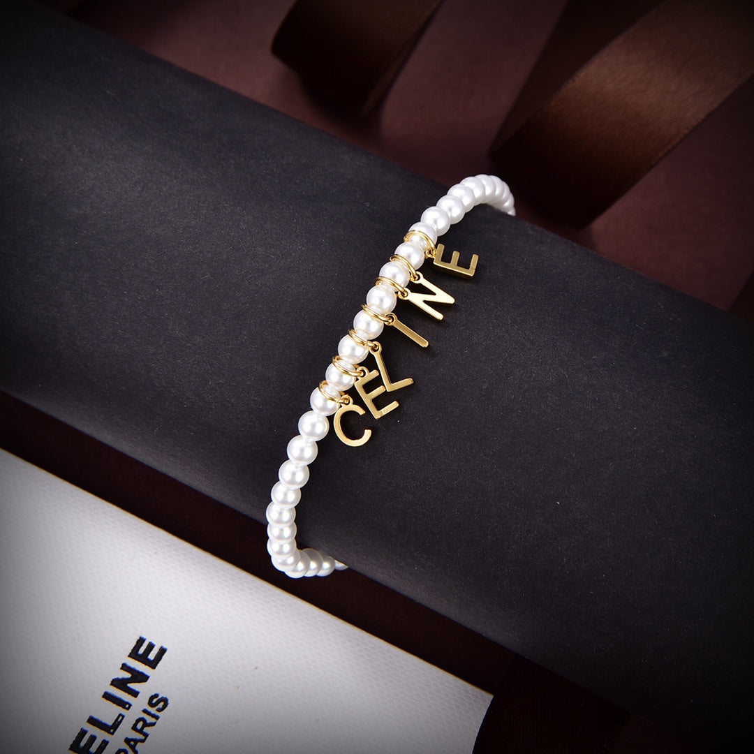 18K Triomphe Paris Pearls Bracelet