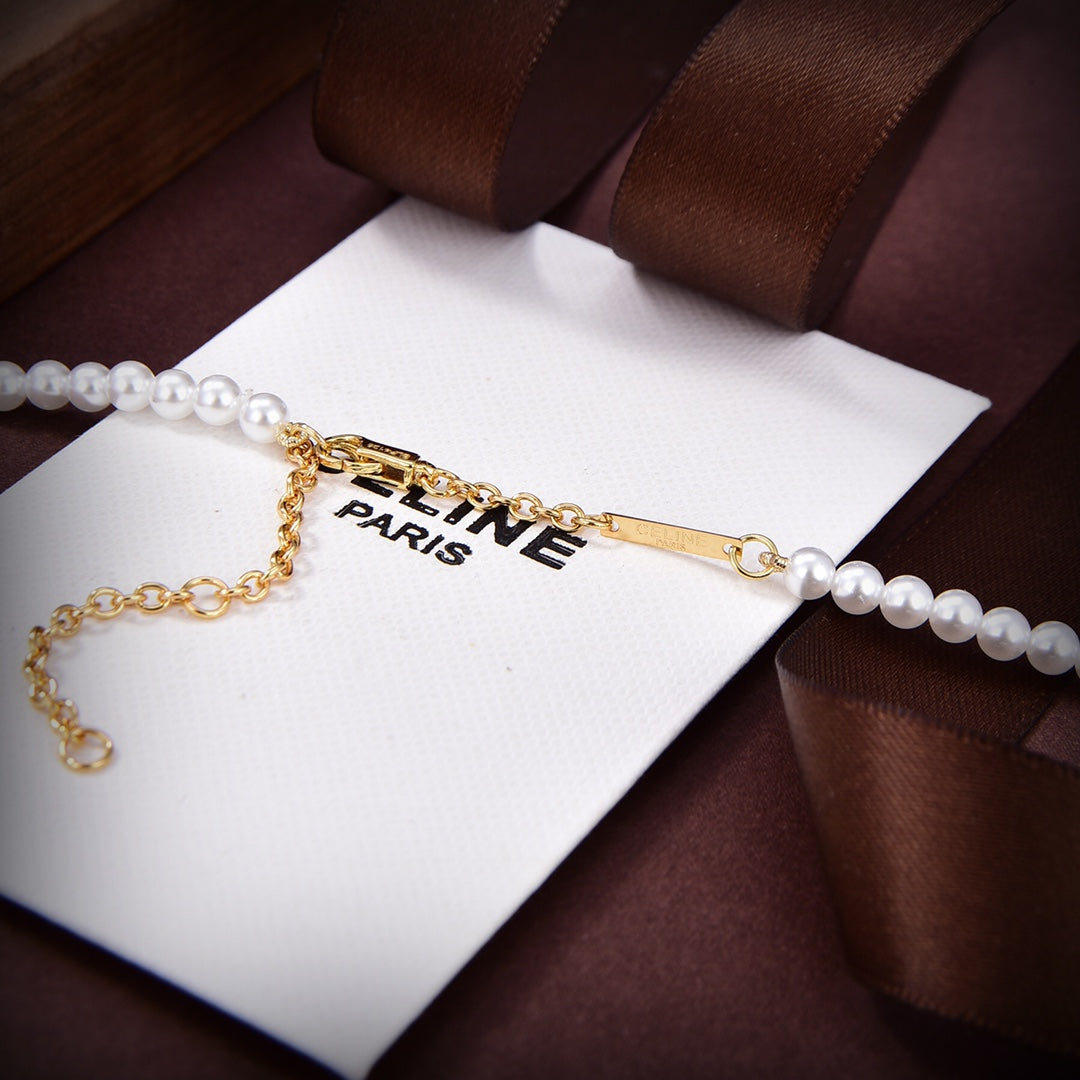 18K Triomphe Paris Pearls Bracelet