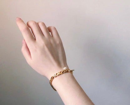 18K CD Revolution Logo Bracelet